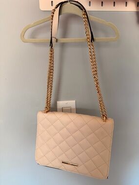 Aldo Handbag
Chic Cream Quilted Satchel